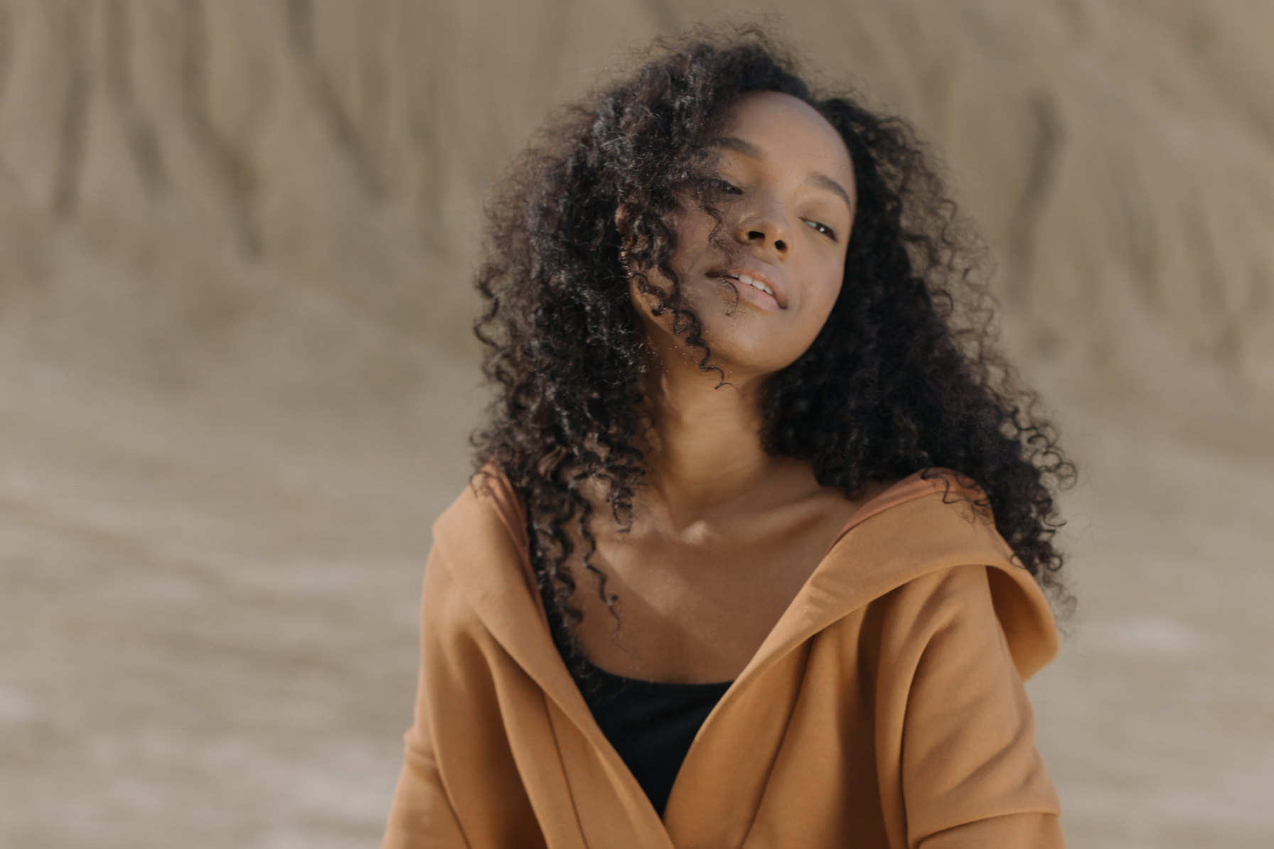 Woman in Brown Hoodie